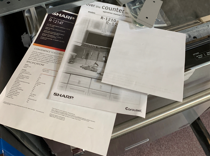 Sharp R1214TY 1.5 cu. ft. Over the Counter Microwave in Stainless Steel with Sensor Cooking Technology *DISPLAY MODEL