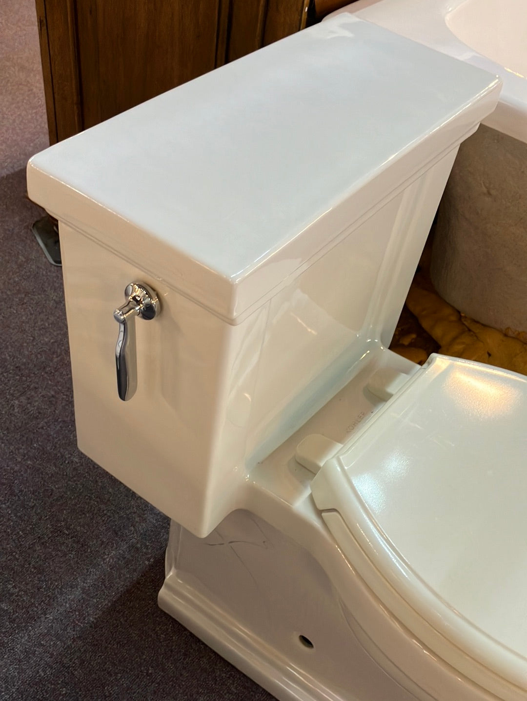 KOHLER K-3619-96 Toilet, Biscuit Seat has some scuff marks on the top