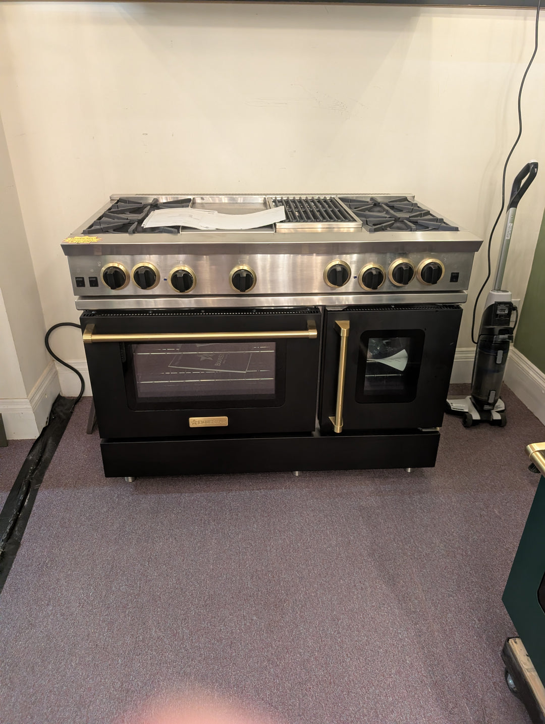 BlueStar RNB Series RNB484GCBSS
48 Inch Pro-Style Gas Range with Open Burners + BlueStar Manhattan Series MH048MACF **No guts shell only**
48 Inch Wall Mount Range Hood shell *Display Models  **Sold as Set**